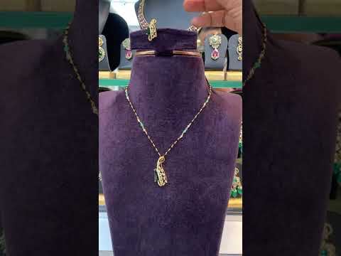 Beautiful black beads chain with green pendant